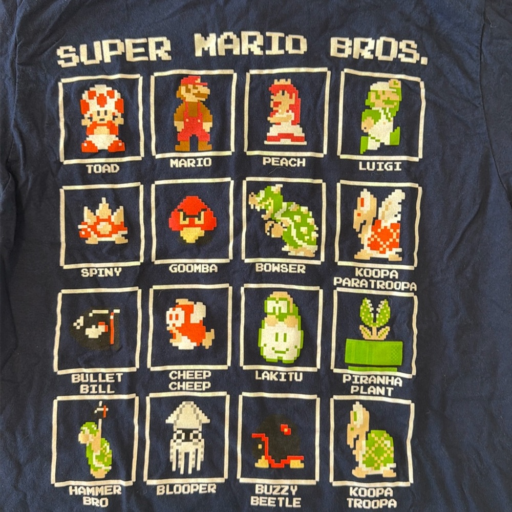 Super Mario Bros navy tshirt. New without tags.